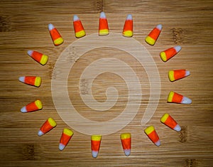 Candy corn set in circle for Halloween message