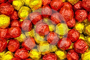 Candy in gold shiny wrappers