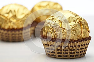 Candy in golden foil