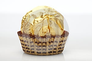 Candy in golden foil