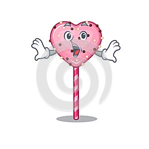 Candy heart lollipop mascot design concept with a surprised gesture