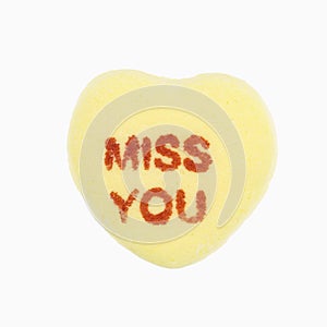 Candy heart on white.