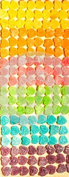 Candy and jelly colorful sweets heart-shaped background