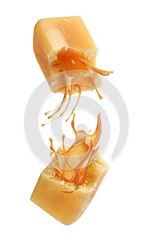 Candy with liquid caramel on a white background