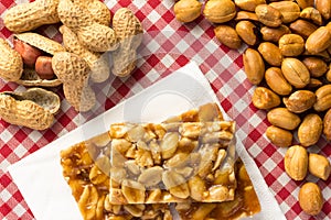 Candy with peanut: Pe de Moleque in Brazil and Chikki in India. photo