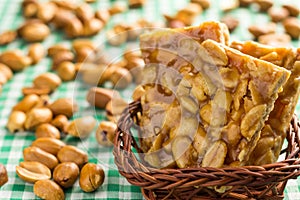 Candy with peanut: Pe de Moleque in Brazil and Chikki in India. photo