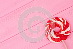 Candy on pink background.