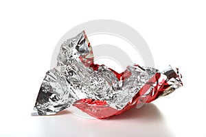 Candy red wrapper empty and open  on white background with copy space for your text