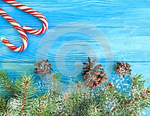 Candy, snow bump festive template greeting decorative design on a wooden background, Christmas tree