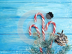 Candy, snow bump festive template holiday decorative design on a wooden background, Christmas tree