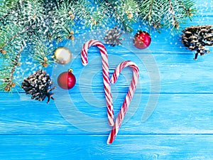 Candy, snow bump frame seasonal traditional on a wooden background, Christmas tree