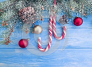 Candy, snow bump frame winter seasonal on a wooden background, Christmas tree