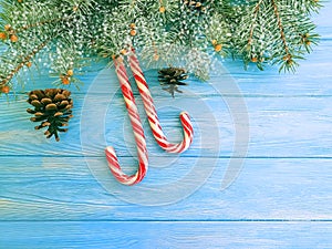 Candy, snow bump xmas festive design on a wooden background, Christmas tree