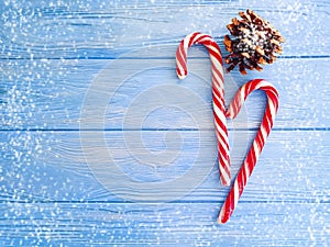 Candy, snow bump xmas on a wooden background, christmas