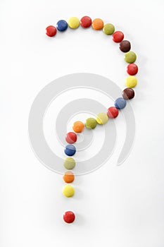 Candy sweets question mark isolated over white