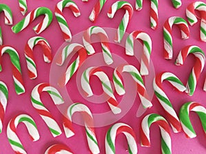 Candycane background on a pink backdrop  for Christmas