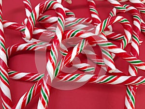 Candycanes candy on a red  background