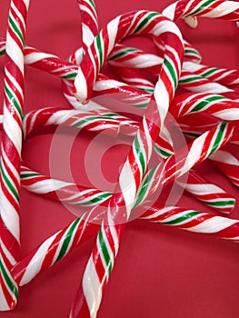 Candycanes candy on a red  background