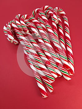 Candycanes candy on a red  background