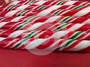 Candycanes candy on a red  background