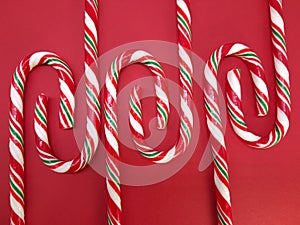 Candycanes candy on a red  background