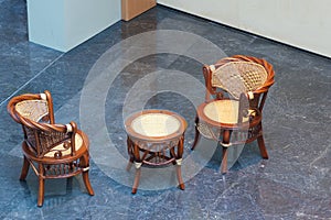 Cane chairs and round table