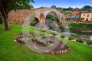 Cangas de Onis roman bridge in Asturias Spain photo