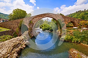 Cangas de Onis roman bridge in Asturias Spain photo