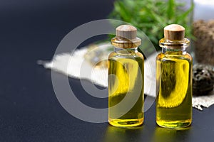 Cannabis CBD oil hemp products, cannabis oil extracts in jars,  patient medical marijuana and oil.  alternative remedy or