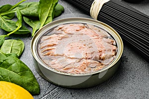 Canned Albacore Wild Tuna, on gray stone table background