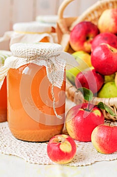 Canned Apple Juice and Apples in Basket, copy space for your tex