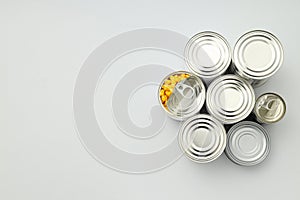 Canned food in blank metal jars, concept of canned food