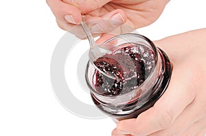 Canned jam and spoon