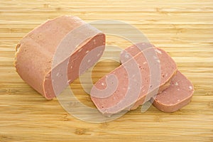 Canned meat on cutting board