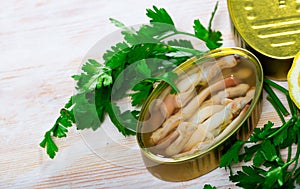 Canned natural mollusks Solen with parsley and lemon