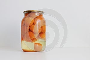 canned peaches in a jar