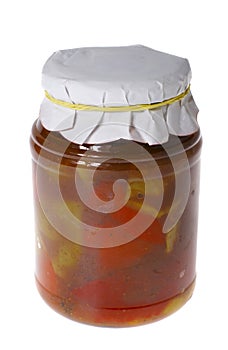 Canned pepper in the jar isolated