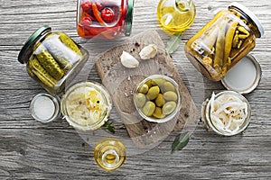 Mixed homemade Preserved vegetables in glass jars