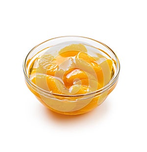 Canned tangerine. Pickled mandarin fruit in bowl isolated on white background