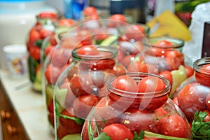 Canned tomato marinated in glass jars at home