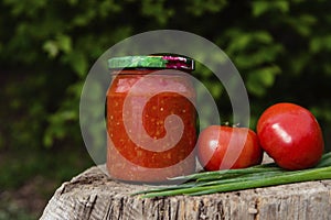 Canned tomato sauce in a jar