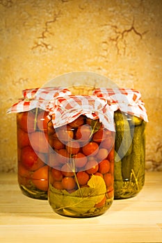 Canned Tomatoes Cherry In Glass Jar.