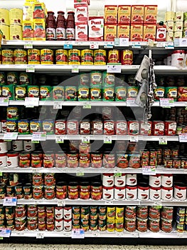 Canned Tomatoes at a Grocery Store