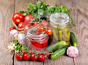 Canned tomatoes and pickled cucumber