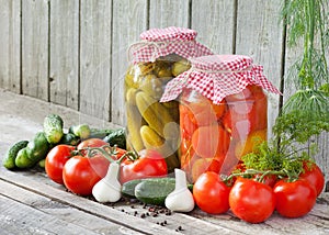 Canned tomatoes and pickled cucumbers