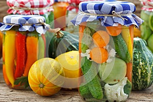 Canned tomatoes and pickled cucumbers