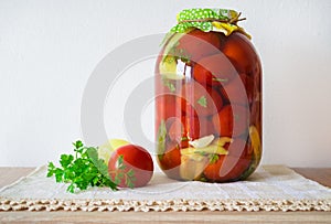 Canned tomatoes on wooden table