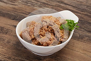 Canned tuna fish in the bowl