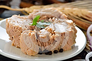 Canned tuna fish on plate