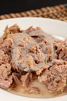 Canned Tuna Fish Slices On The Chinesse Background Table